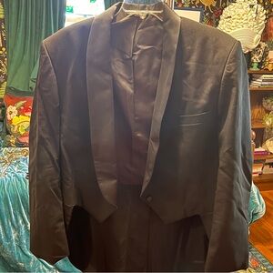 Black tuxedo jacket with tails. Vintage.